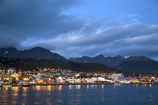 The harbor and city of Ushuaia at dusk on the island of Tierra del Fuego, Argentina