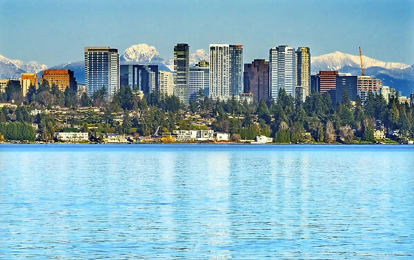 High-rise buildings, Lake Washington and snowcapped Cascade Mountains, Bellevue
