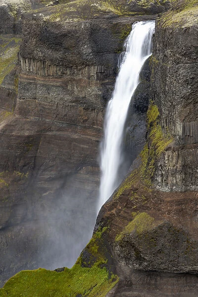 Iceland, Southern Highlands, Haifoss Waterfall. The Fossa River flowing over the cliffs