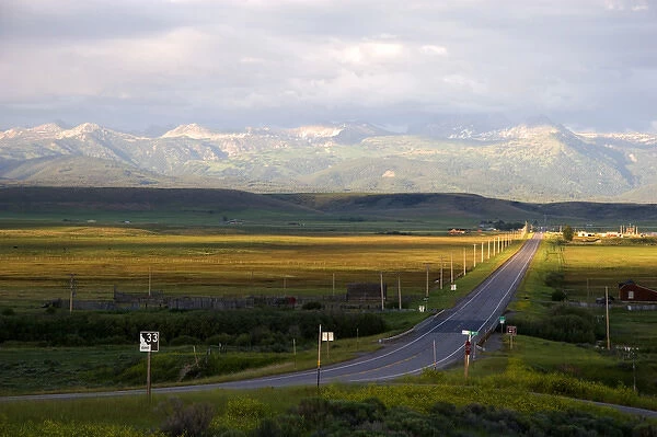 Idaho Highway 33 in Teton County with Teton Mountains near sunset looking east