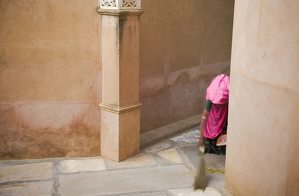 India, Rajasthan. Woman sweeping. Credit as: Jim Nilsen  /  Jaynes Gallery  /  DanitaDelimont