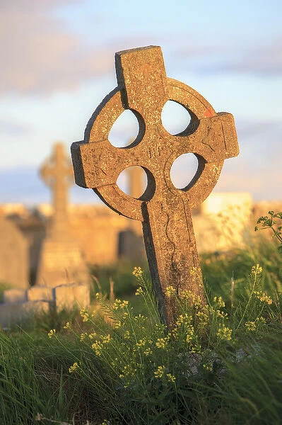 Inishmore Island. Aran Islands. Ireland. Celtic cross in sunset