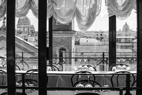 Italy, Rome. Scene of skyline and St. Peters dome from restaurant on Viale della