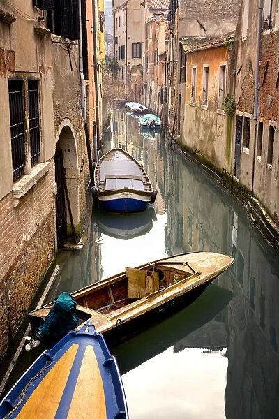 Italy, Venice. Gondolas moored in canal. Credit as: Jim Nilsen  /  Jaynes Gallery  /  DanitaDelimont