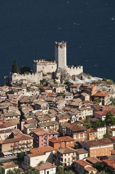 Italy, Verona Province, Malcesine. Aerial town view and Castello Scaligero from Monte Baldo