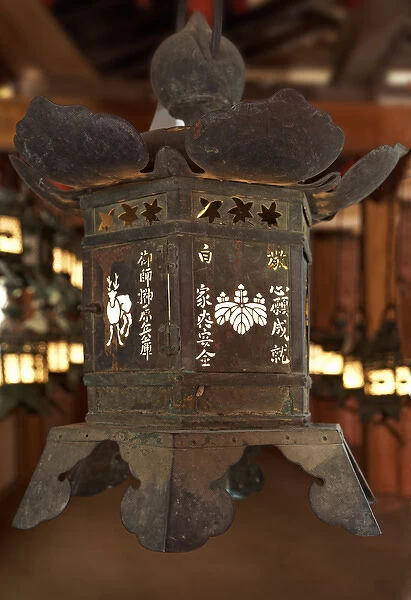 Japan, Nara. Detail of hanging lantern at Kasuga Taisha Shrine