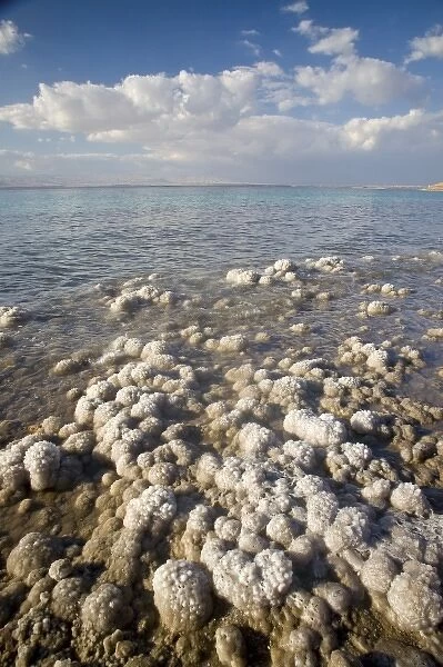 JORDAN. Briny, salt encrusted shoreline on Jordanian side of Dead Sea, worlds lowest at 1