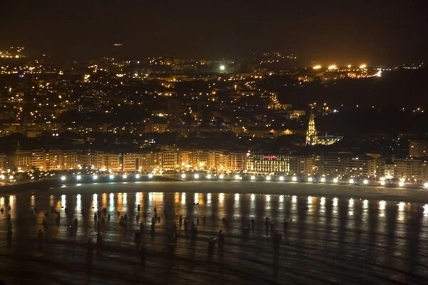 La Concha Bay and the city of Donostia-San Sebastian at night, Guipuzcoa, Basque Country