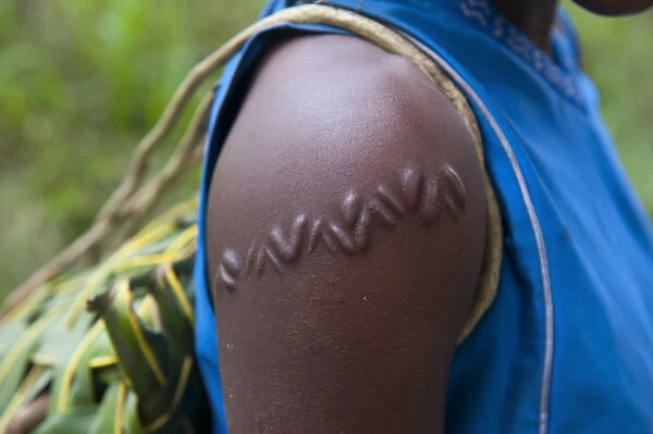 Local girl with typical scar near, Volcano Yasur, Island of Tanna, Vanuatu, South Pacific
