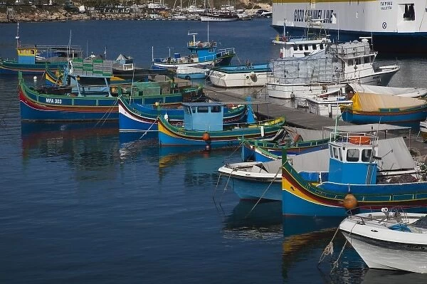 Malta, Gozo Island, Mgarr, harbor view with luzzu traditional fishing boats