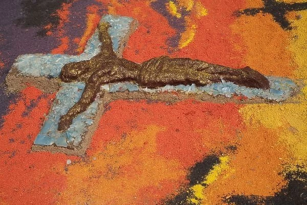 Mexico, Oaxaca, sand tapestry (tapete de arena) of Jesus Christ in Zocalo plaza