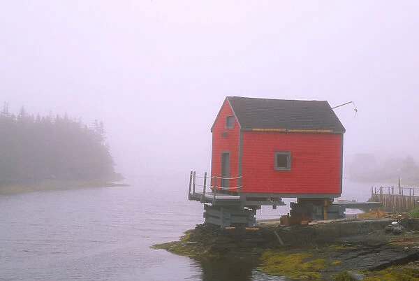 N. A. Canada, Nova Scotia, Stonehurst. Red fishing shed in fog