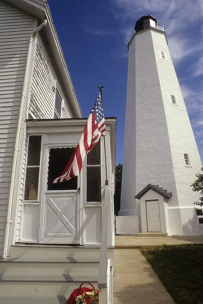 New Jersey: Gateway National Recreation Area, Sandy Hook LIghthouse (built 1764) with American flag