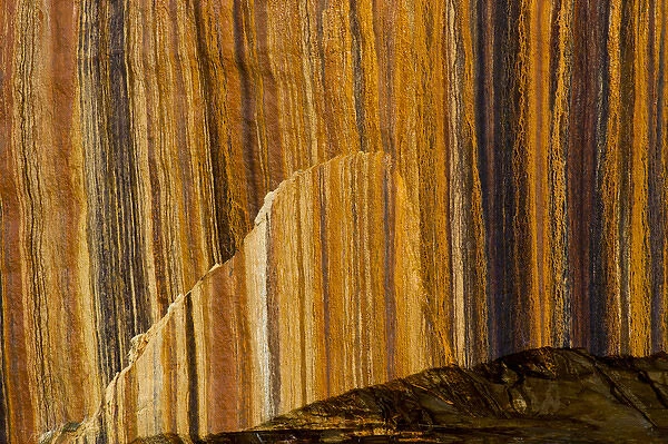 North America, USA, Michigan. Mineral seep wall detail along shore of Lake Superior