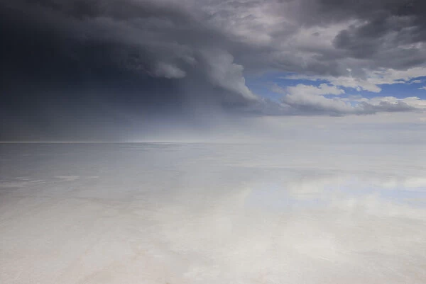 North America, USA, Utah, Bonneville Salt Flats. Passing thunderstorm over Bonneville Salt Flats