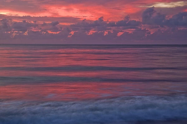 North Carolina, USA, Georgia, Tybee Island. Sunrise reflections at the beach