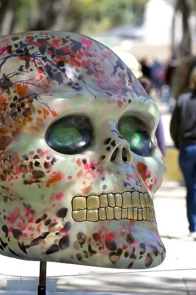 A painted skull is part of a public art display to celebrate the Day of the Dead in Mexico City