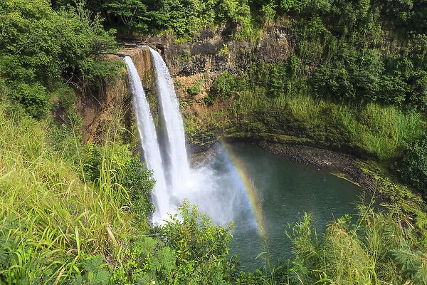 Rainbow in Wailua Falls, Kauai. Hawaii. USA