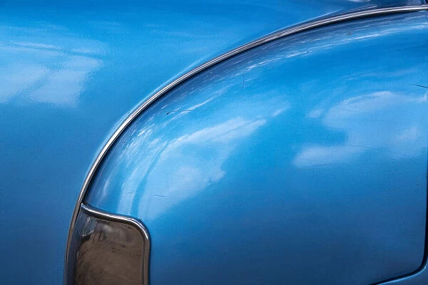 Detail of rear fender on classic blue American Chevrolet in Vinales, Vinales Valley, Cuba