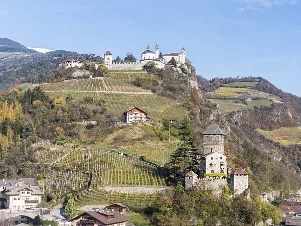 Saeben Monastery and Branzoll Castle near Klausen in the Eisack Valley during autumn