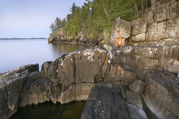 Shore rock and cliffs at sunset, opposite Windmill Rock View Campsite, Rainy Lake