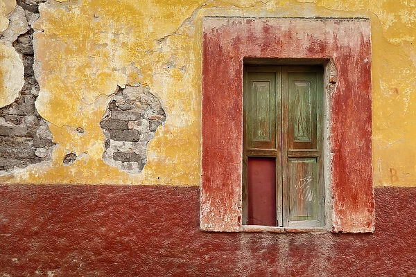 South America, Mexico, San Miguel de Allende. Window in colorful wall. Credit as
