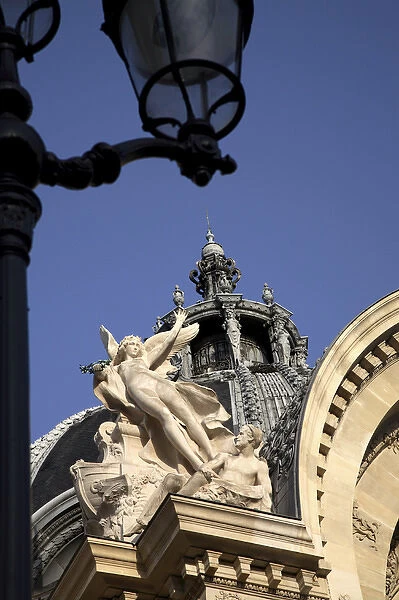The stone sculptures decorating the roof of Petit Palais. Paris. France