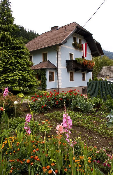 Traditional home with flowers in village of Tamsweg Austria in Alps alpine