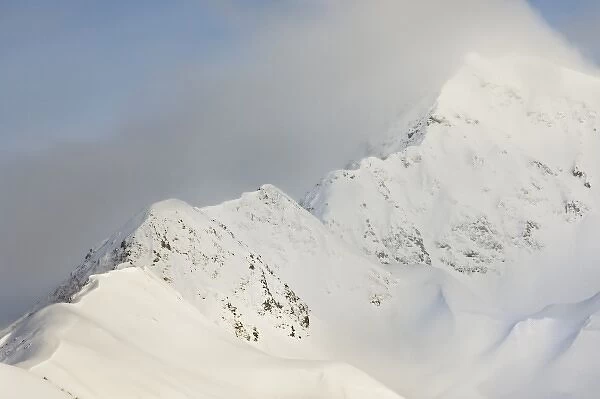 USA, Alaska, Kenai Mountains. Ridge of snow-covered mountains along Turnagain Pass