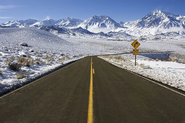 USA, California. Road into Sierra Nevada Mountains in winter