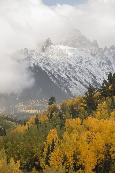 USA, Colorado, Sneffels Range. Snow clouds over Mt Sneffels at sunset. Credit as