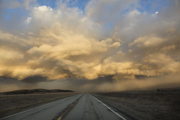 USA, Colorado. Spring storm clouds at sunrise above South Park