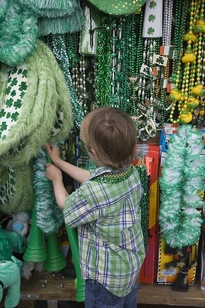 USA; Georgia Savannah. Young boy looking for a St. Patricks Day souvenir. (MR)