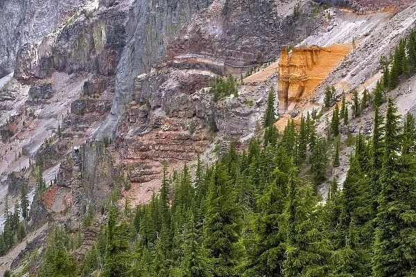 USA, Oregon, Crater Lake NP. Orange pumice rock eroded to form the Pumice Castle