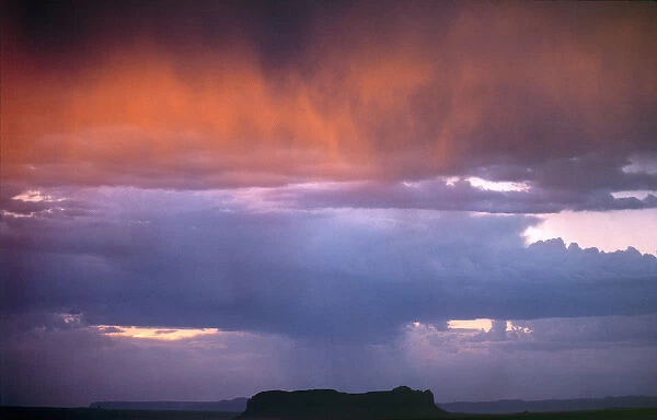 USA, Utah, Monument Valley. An afternoon thunderstorm over Utahs Monument Valley