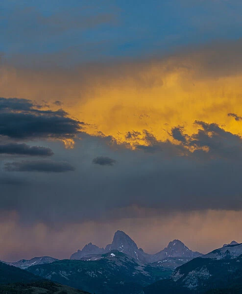 USA, Wyoming. Dramatic sky at sunset over Grand Teton, west side of Teton Mountains