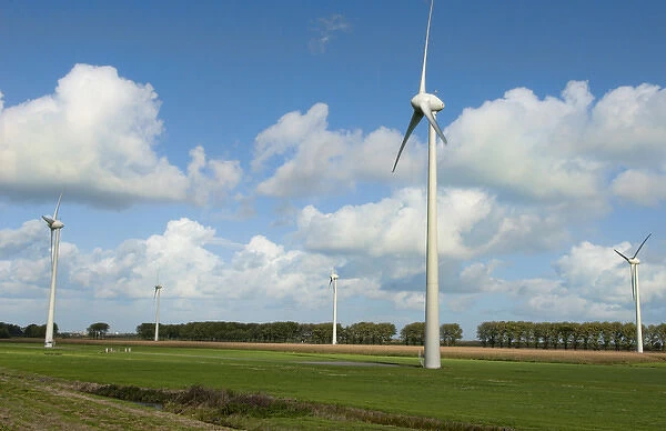Wind energy wind mills large in farmland outside of Amsterdam Holland Netherlands