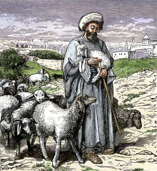 Mideastern shepherd. Shepherd carrying a lamb in the Middle East.