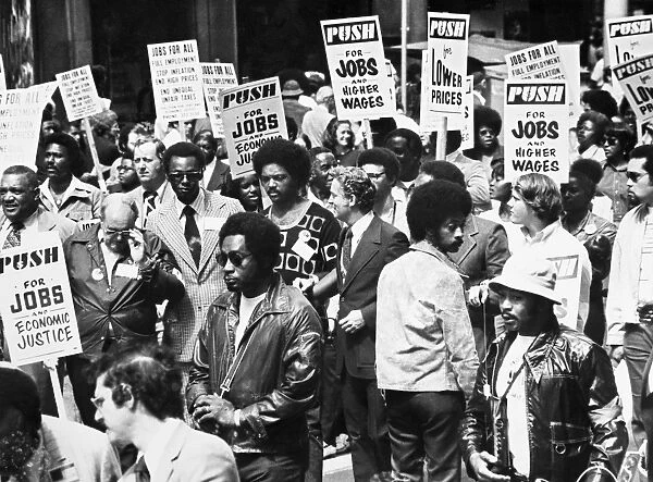 American civil rights leader. Jackson (center, without jacket) at an Operation PUSH (People United to Save Humanity) demonstration for jobs and higher wages, Chicago, Illinois, 1973