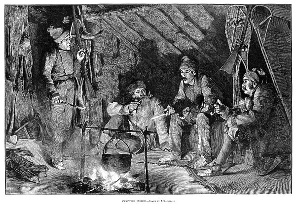 AMERICAN HUNTERS, 1885. Hunters telling stories around a campfire. Engraving, American