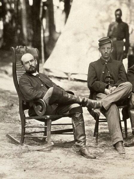 CHARLES FRANCIS ADAMS, JR. (1835-1915). American army officer, railroad executive, and historian. Adams (left) photographed with a fellow officer of the 1st Massachusetts Cavalry at Petersburg, Virginia, during the American Civil War, August 1864