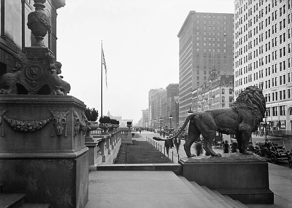 CHICAGO, c1910. The lion statue at the entrance of the Art Institute of Chicago