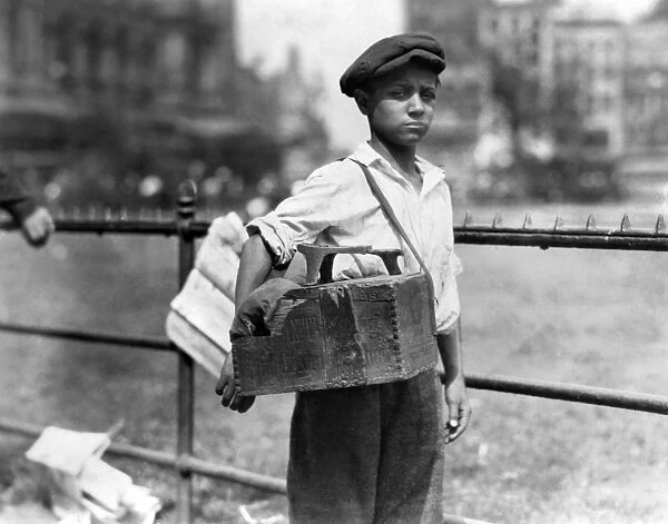 CHILD LABOR: BOOTBLACK, 1924. Young bootblack at City Hall Park, New York City