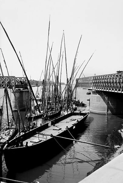 EGYPT: CAIRO. Sailboats passing through the open Great Bridge that spans the Nile River in Cairo