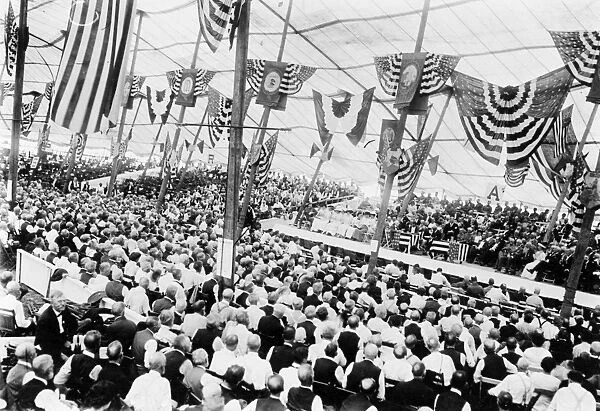 GETTYSBURG REUNION, 1913. Crowds of Union and Confederate veterans gathered inside an assembly tent at Gettysburg, Pennsylvania, July 1913, at the time of the reunion commemorating the 50th anniversary of the Battle of Gettysburg during the American Civil War