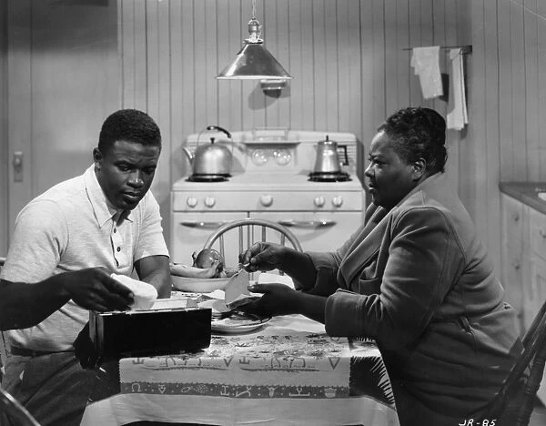 JACKIE ROBINSON STORY, 1950. Jackie Robinson and Louise Beavers in a scene