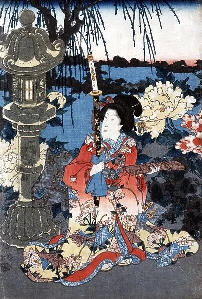 JAPAN: WOMAN IN GARDEN. A woman seated beside giant peonies in a garden in Japan