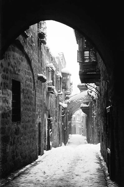 JERUSALEM: WINTER. Location of the fifth station of the cross on the Via Dolorosa in Jerusalem, during a snowy winter, early 20th century