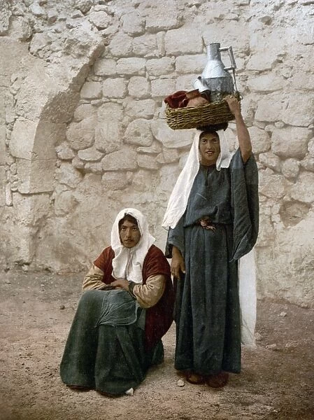 JERUSALEM WOMEN, c1900. Two women at the side of a street in Jerusalem. Photochrome