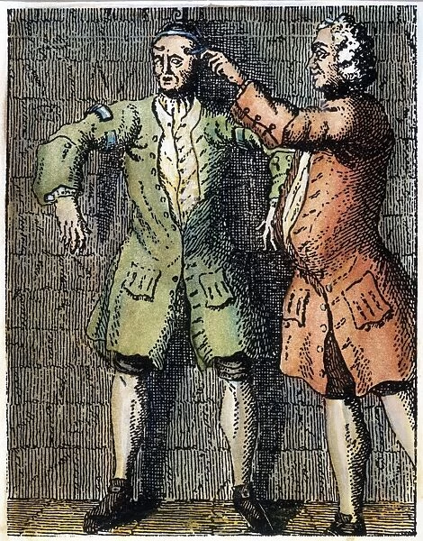 LONDON: DEBTORs PRISON. A debtor in the Marshalsea Prison, London, attached to the prison wall by an iron skullcap. 18th century colored engraving